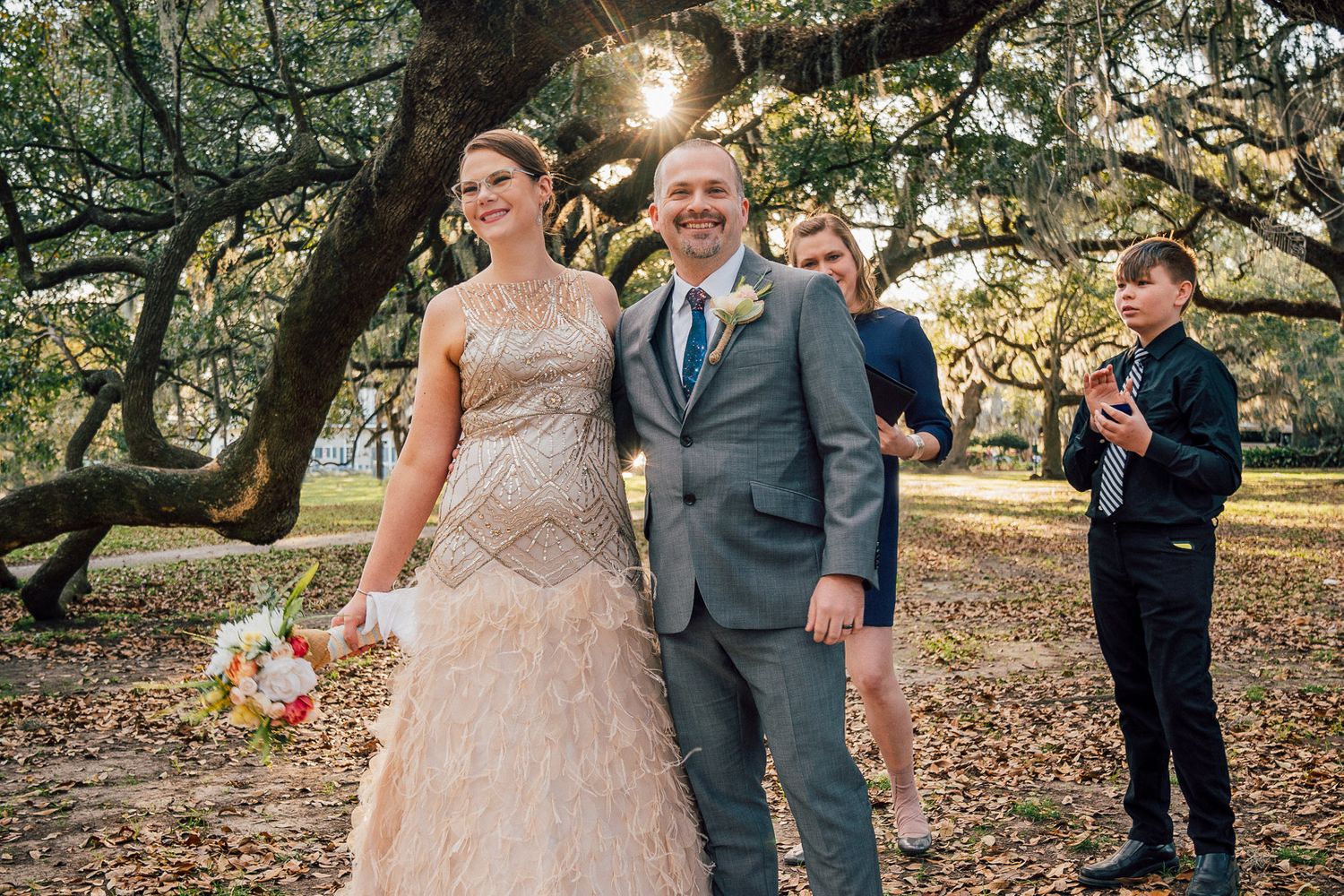 Bride and Groom laughing after wedding ceremony in New Orleans, City Park