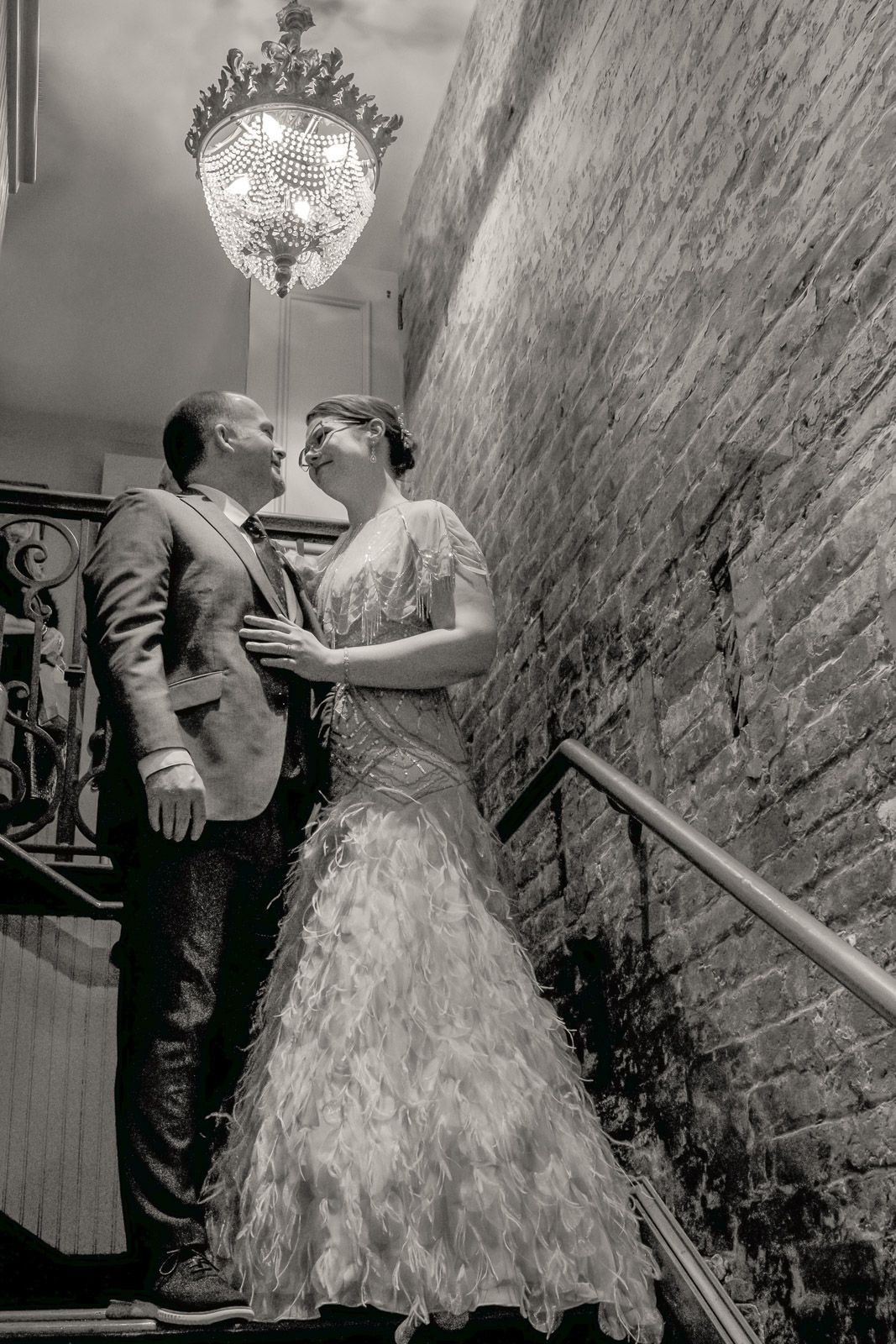 Bride and Groom classic formal on stairwell at Ralph's on the Park