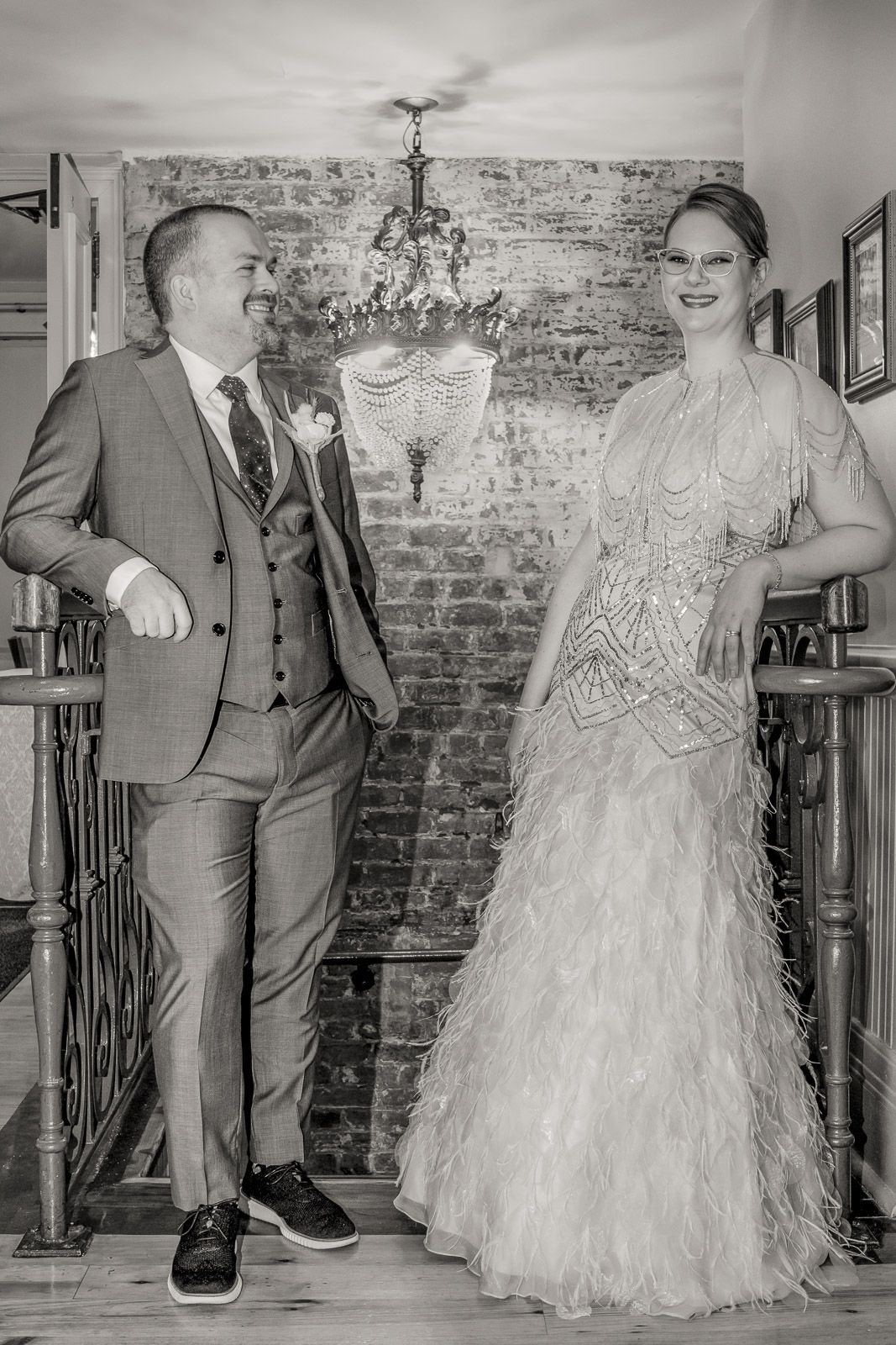 Bride and Groom classic formal on stairwell at Ralph's on the Park