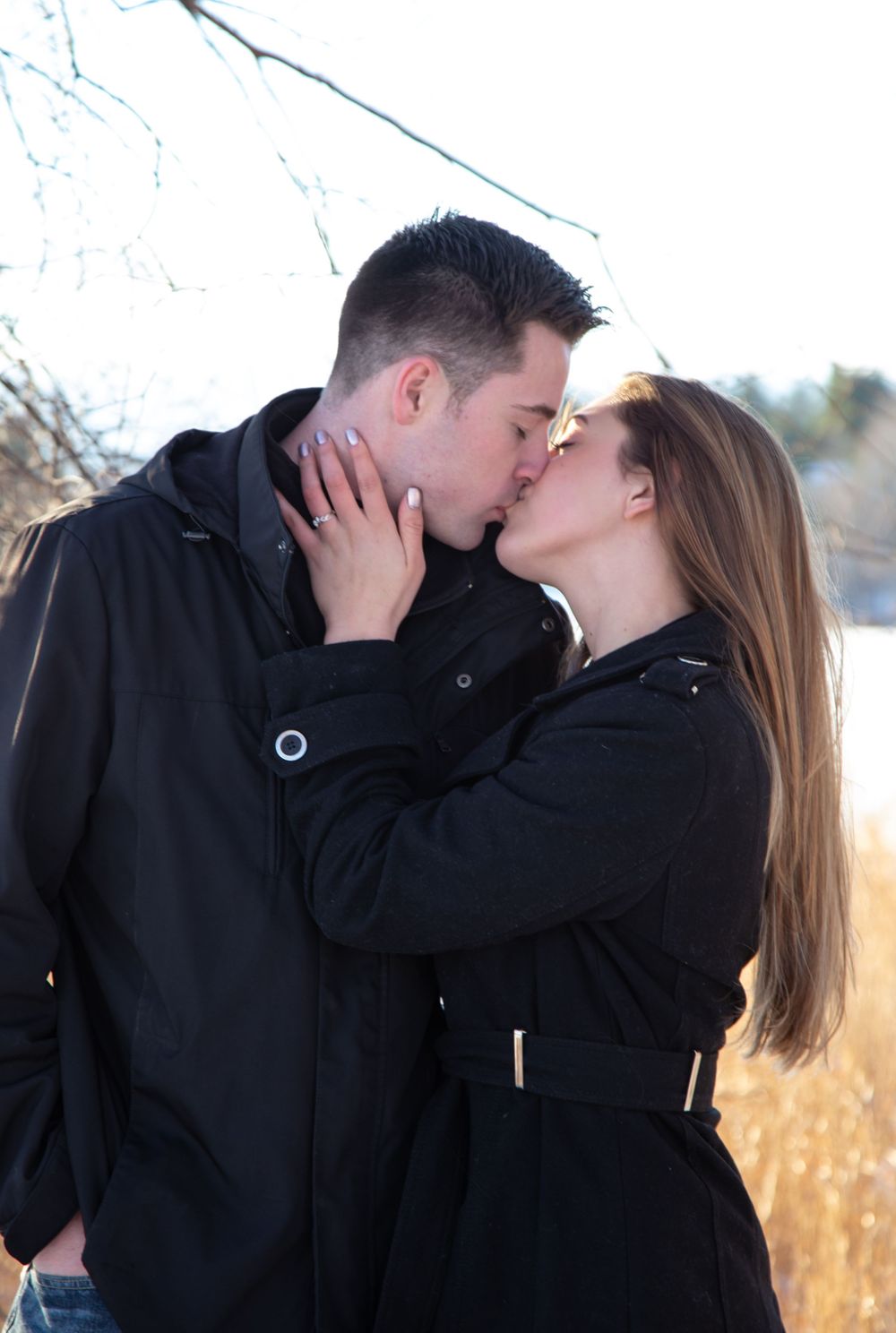 Engagement Photography of Bride and Groom kissing