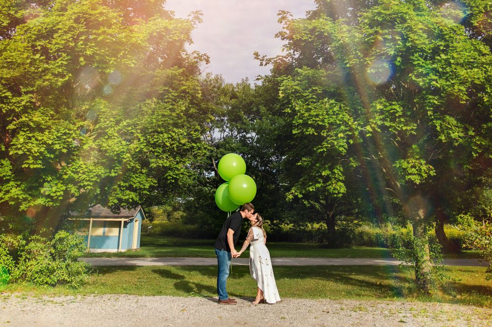 Cute and quirky engagement photos at Fanshawe Conservation Area London Ontario by wedding photographer Shawn Van Daele