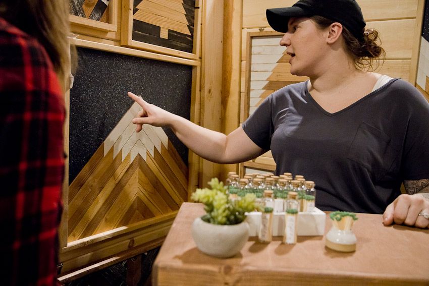 Pinology Puyallup Evergreen Root NW Booth owner explaining how to custom order wooden made wall art