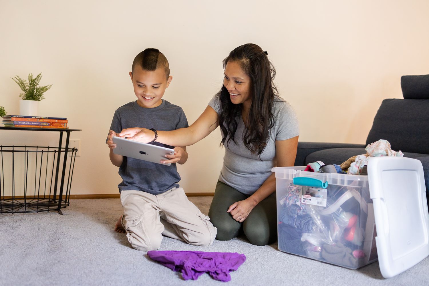 mom and son sitting on ground taking photos to sell Homeschooling entrepreneur mom Maple Valley, WA branding photo