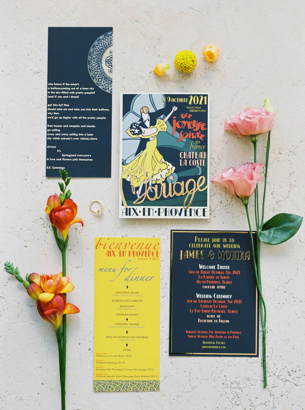 Artistic and colorfull wedding invitation, floral arrangement, and book on a table. A beautiful setup for a special day.
