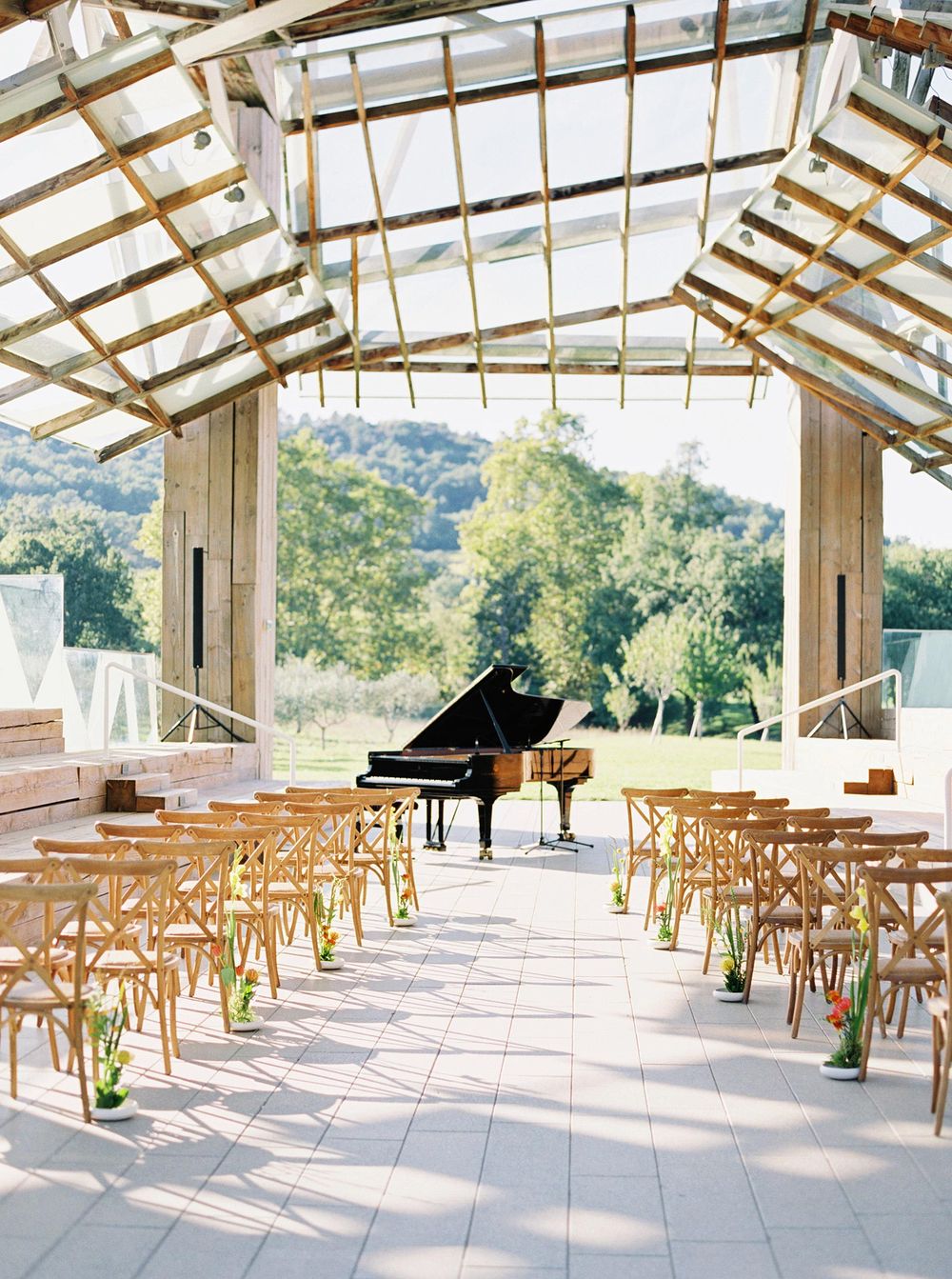 Romantic outdoor wedding ceremony with piano in beautiful Provence at Château La Coste.