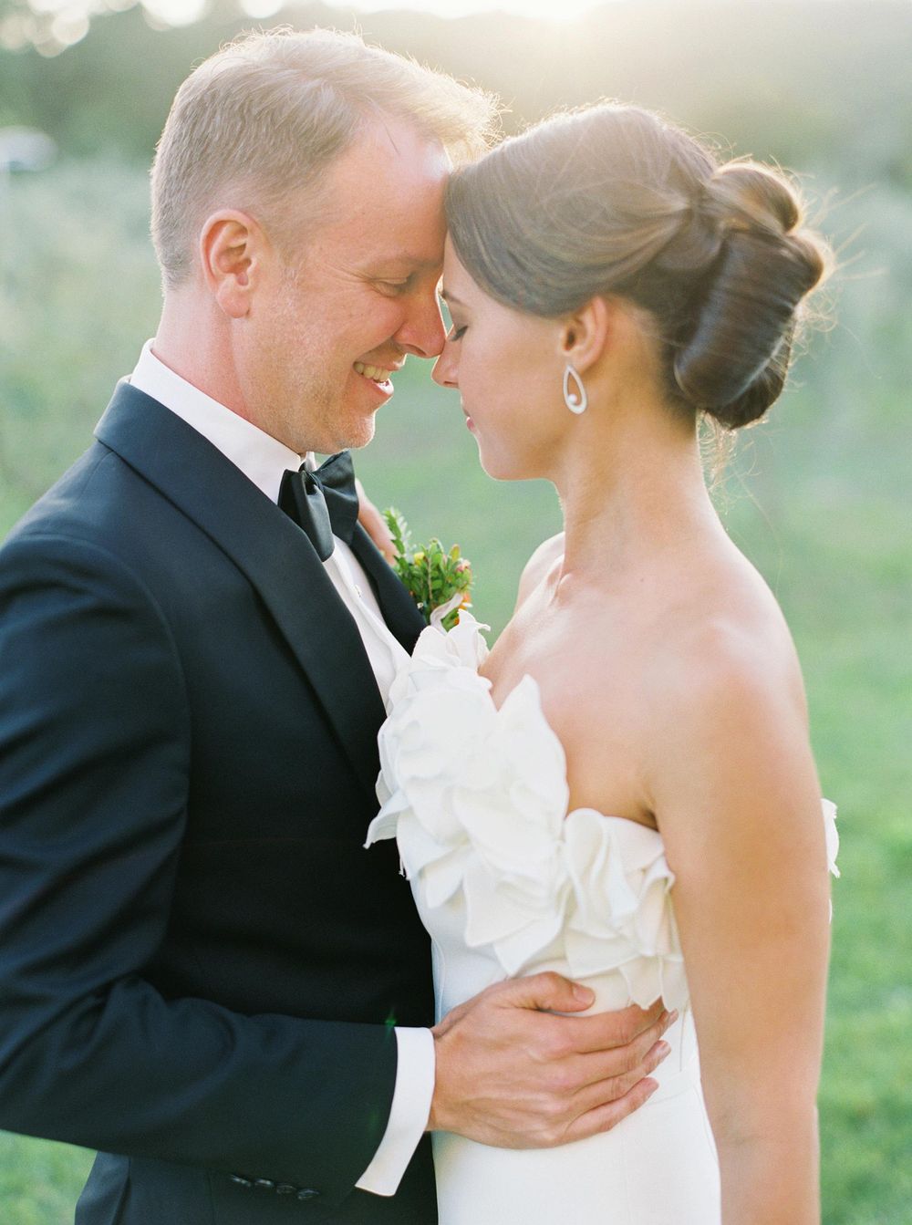 Elegant bride and groom portrait session in olive grove at Château La Coste, Provence.
