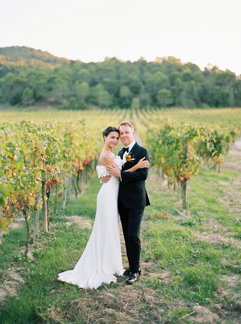 Newlyweds celebrating their beautiful countryside wedding at Château La Coste, Provence.
