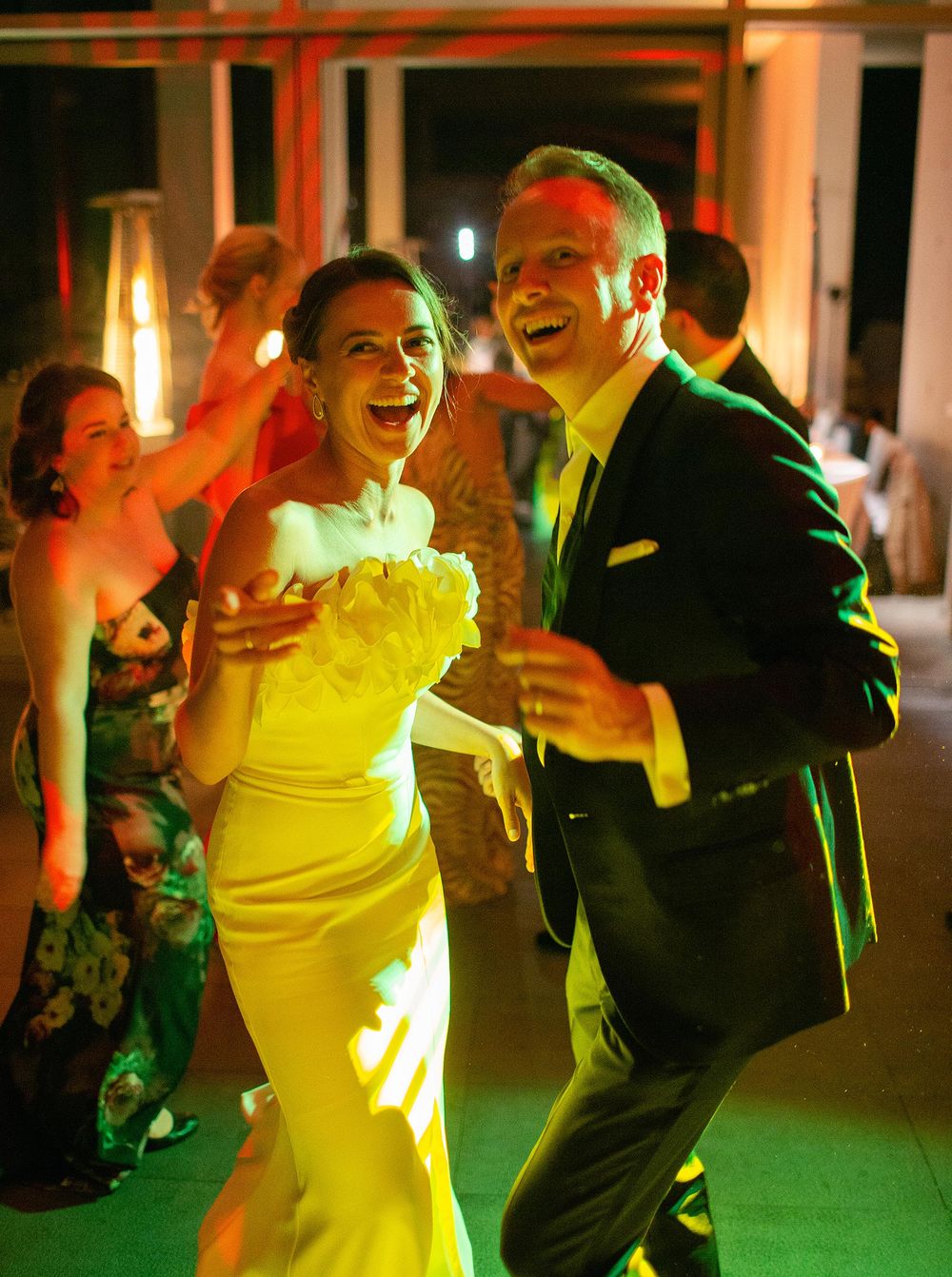 The bride and groom sharing a romantic dance as they celebrate their wedding.