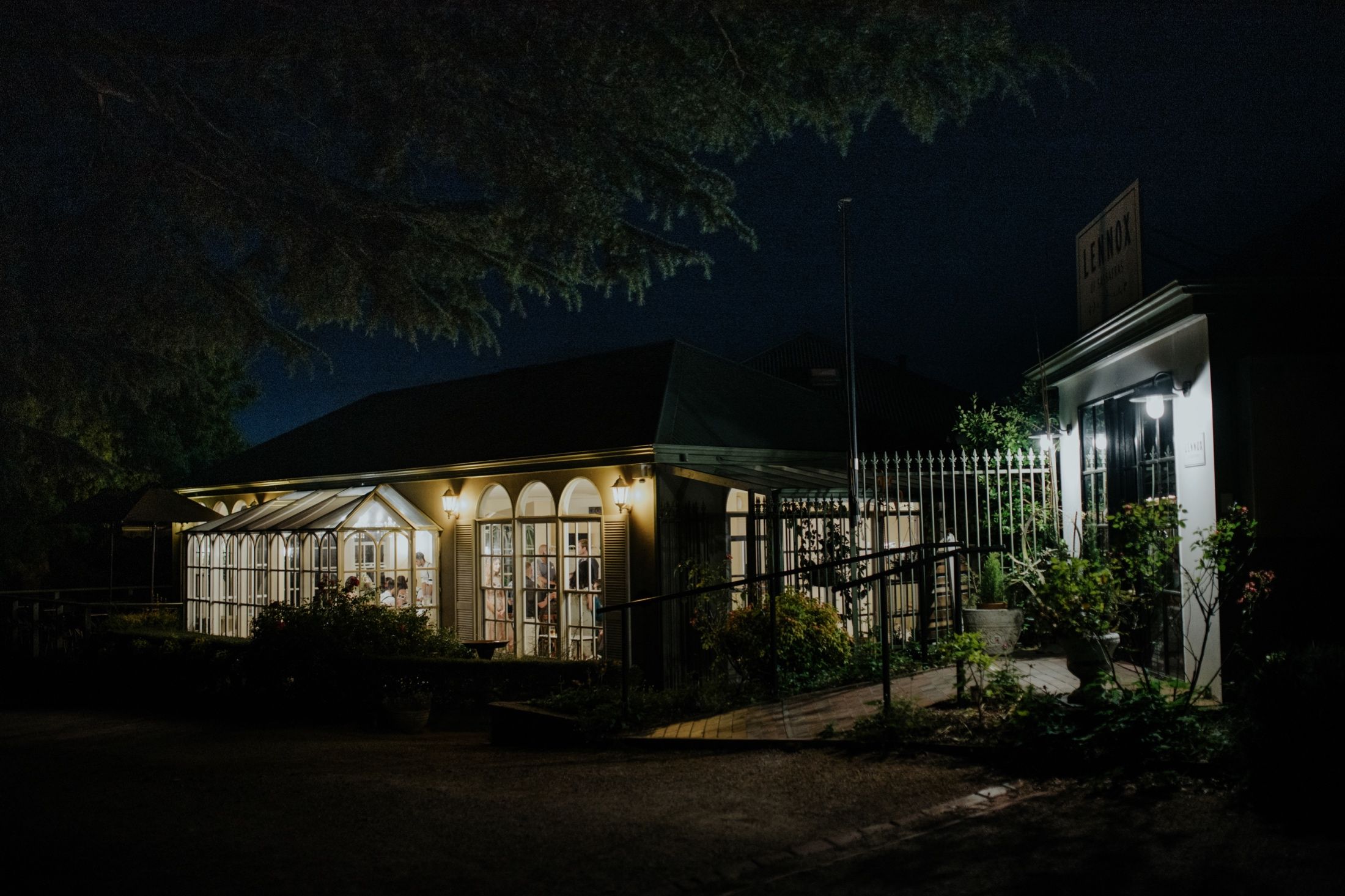 Night shot of reception from outdoors in carpark at Fortnums