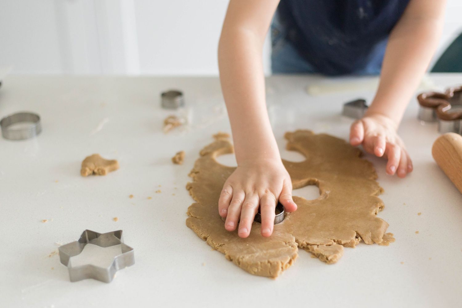 baking Christmas cookies in kitchen