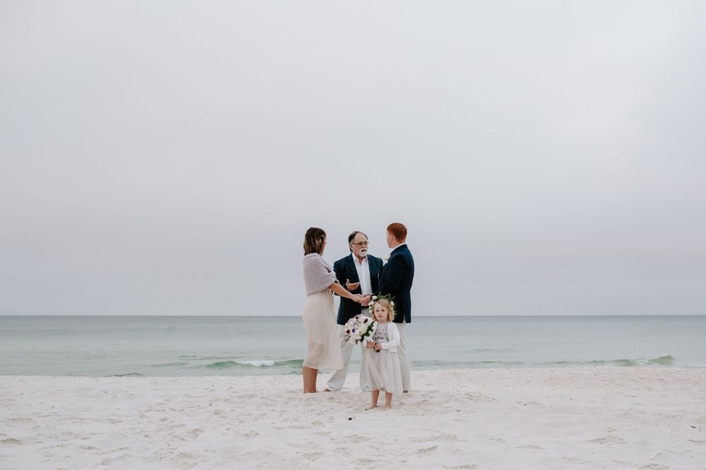 couple saying their vows on a Florida Beach during their elopement