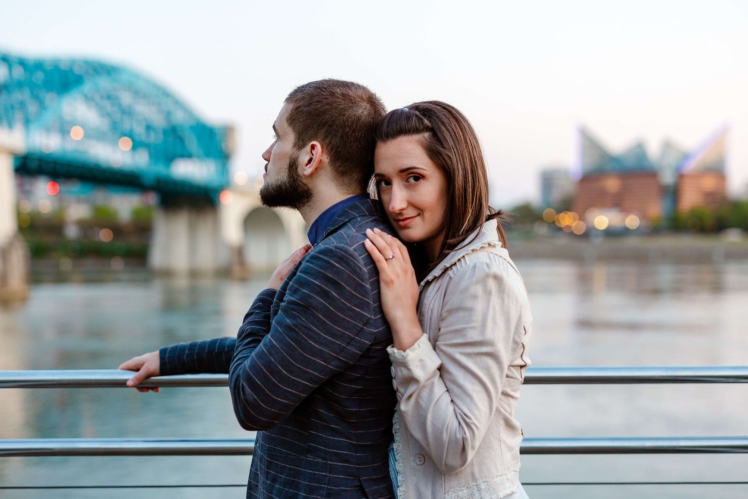 Engagement photo photographer Sarah Swainson captures a couple during their engagement session at Coolidge Park.