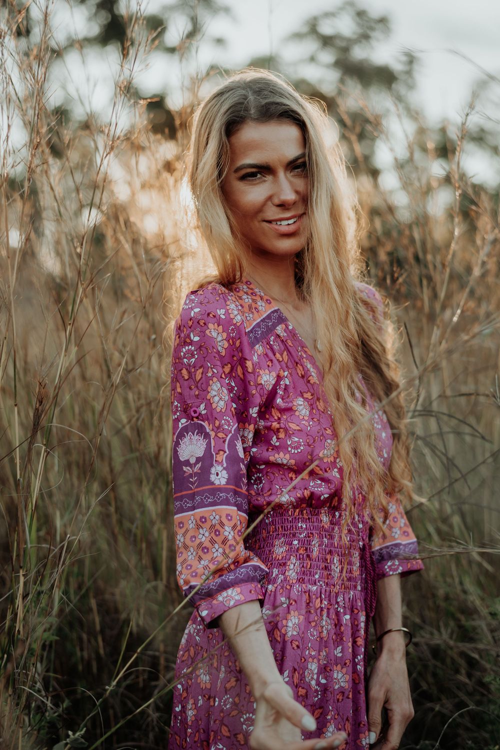 model posing in a bush