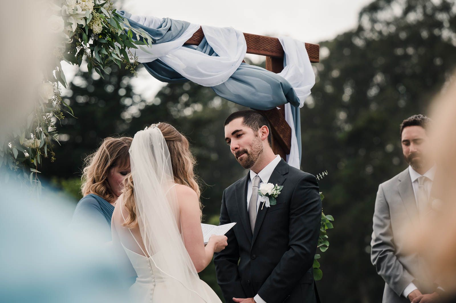 grooms sweet reaction as bride reads her vows