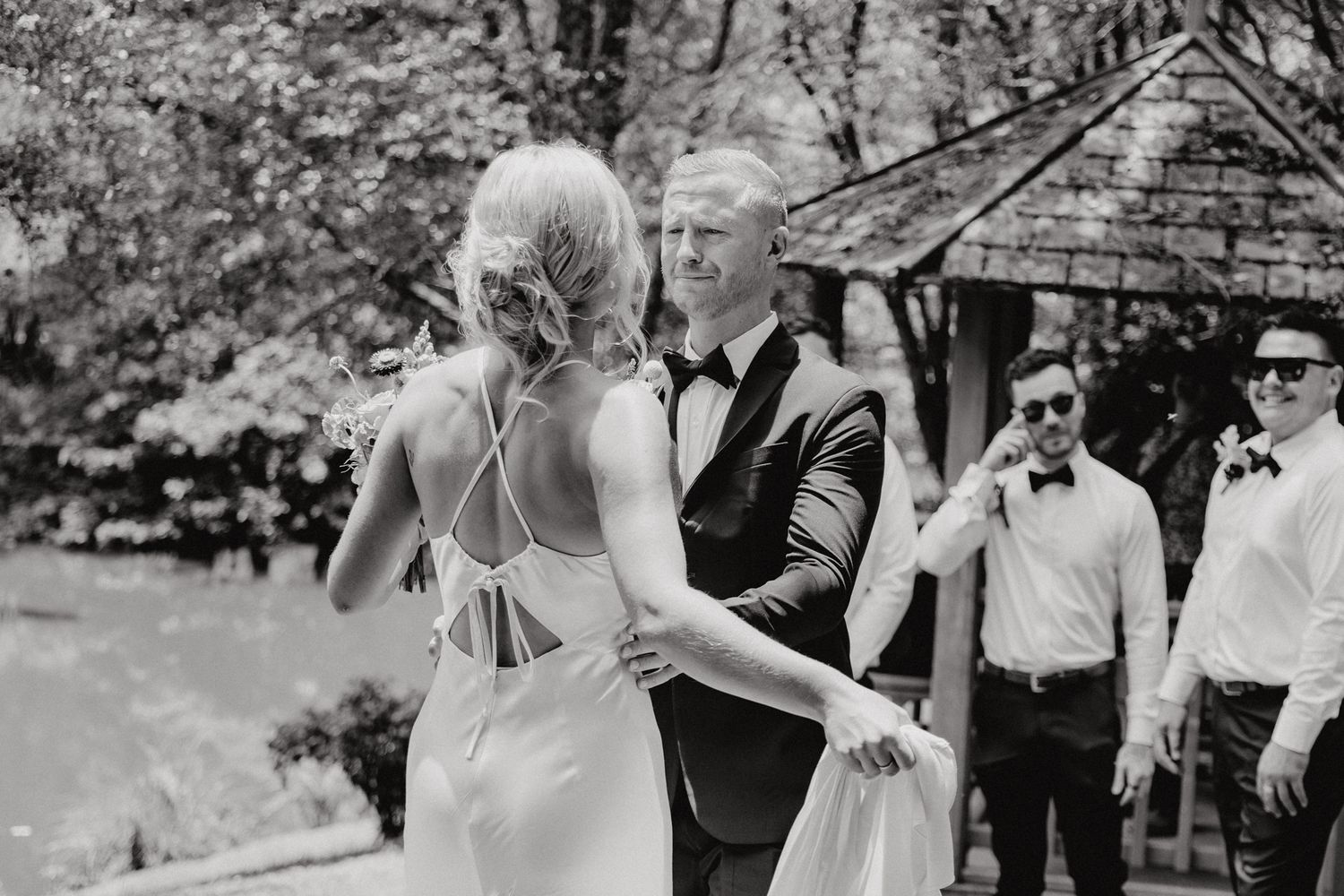 A couple during their first look at their backyard wedding with Apertured Media Auckland Wedding Photographer