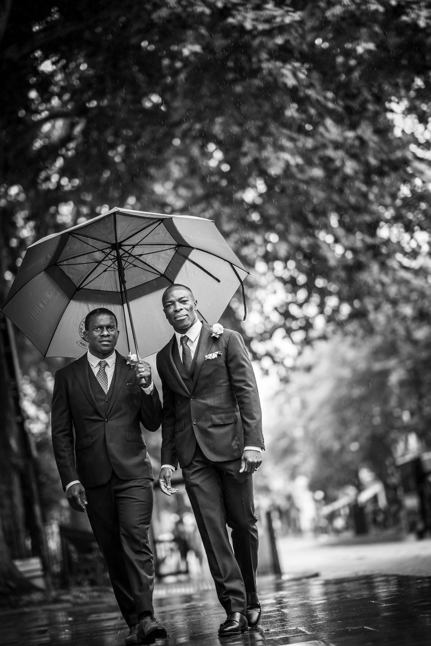 two grooms arrive at their wedding in islington
