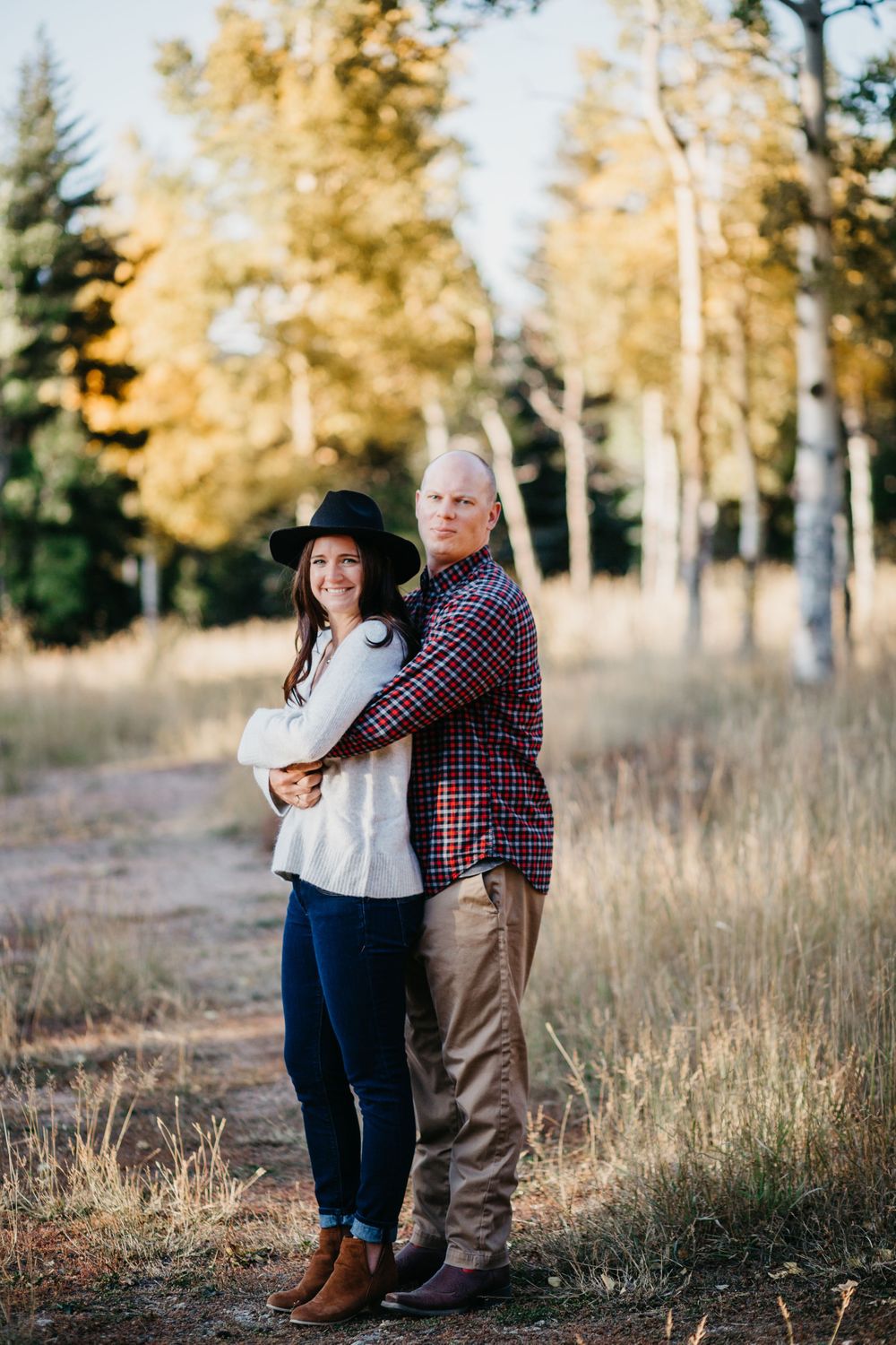 Cute couple pose Colorado Fall Engagement Session