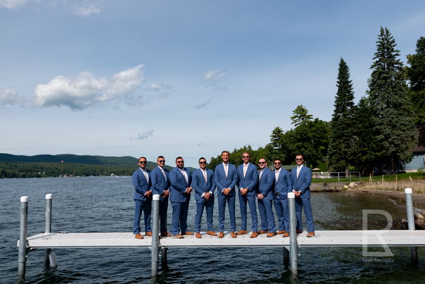 Leah Ramuglia Photography groomsmen on dock in Lake George, NY, New York destination wedding