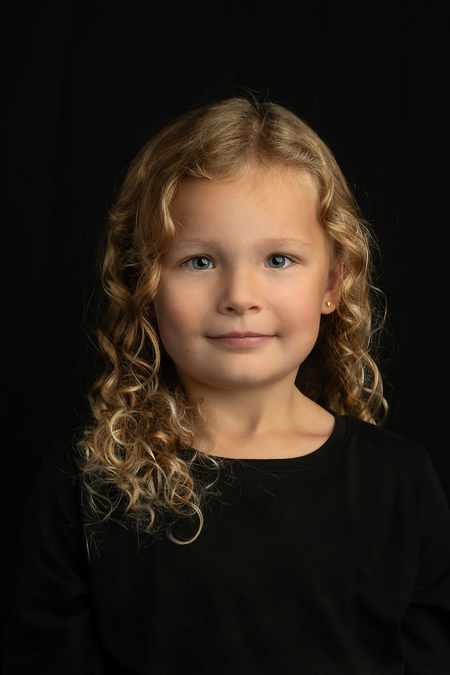 girl poses for classic heirloom portrait