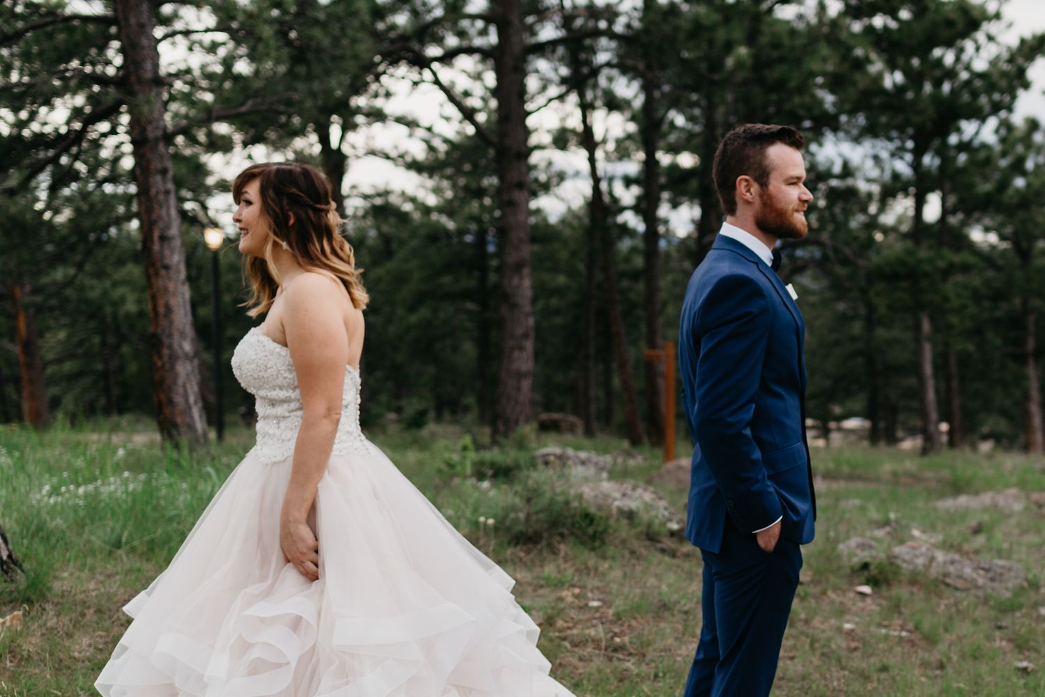 first look, tattooed bridge, alternative wedding, colorado, forest, mountains, beautiful, best colorado weddings