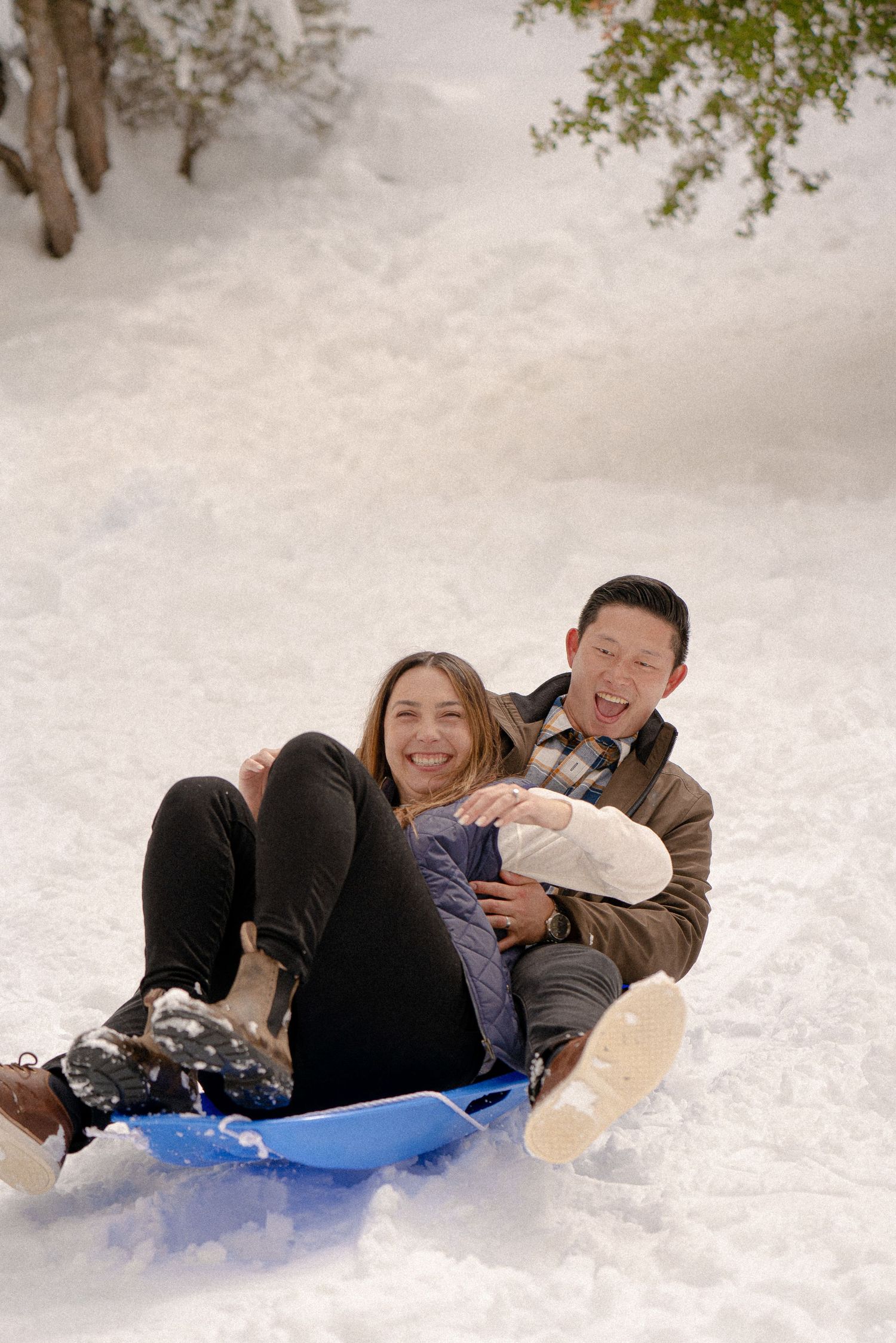 Mt. Baldy California Couples Session - snow day with sledding and snowball fights - forest and cabin adventure session