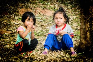 Environmental portrait of Akha Tribe children in village