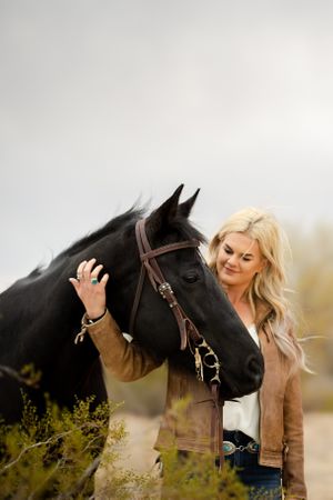 Horse and rider bond connection portraits photography Equine Photographer black Quarter Horse Western riding cowgirl