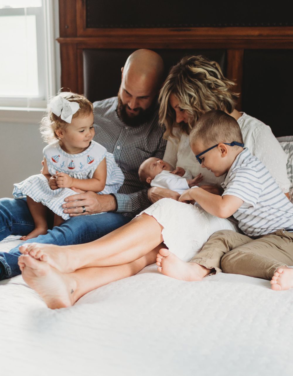 When do you plan to have newborn family photos taken? Brooke Grogan Photography offers her insight.
