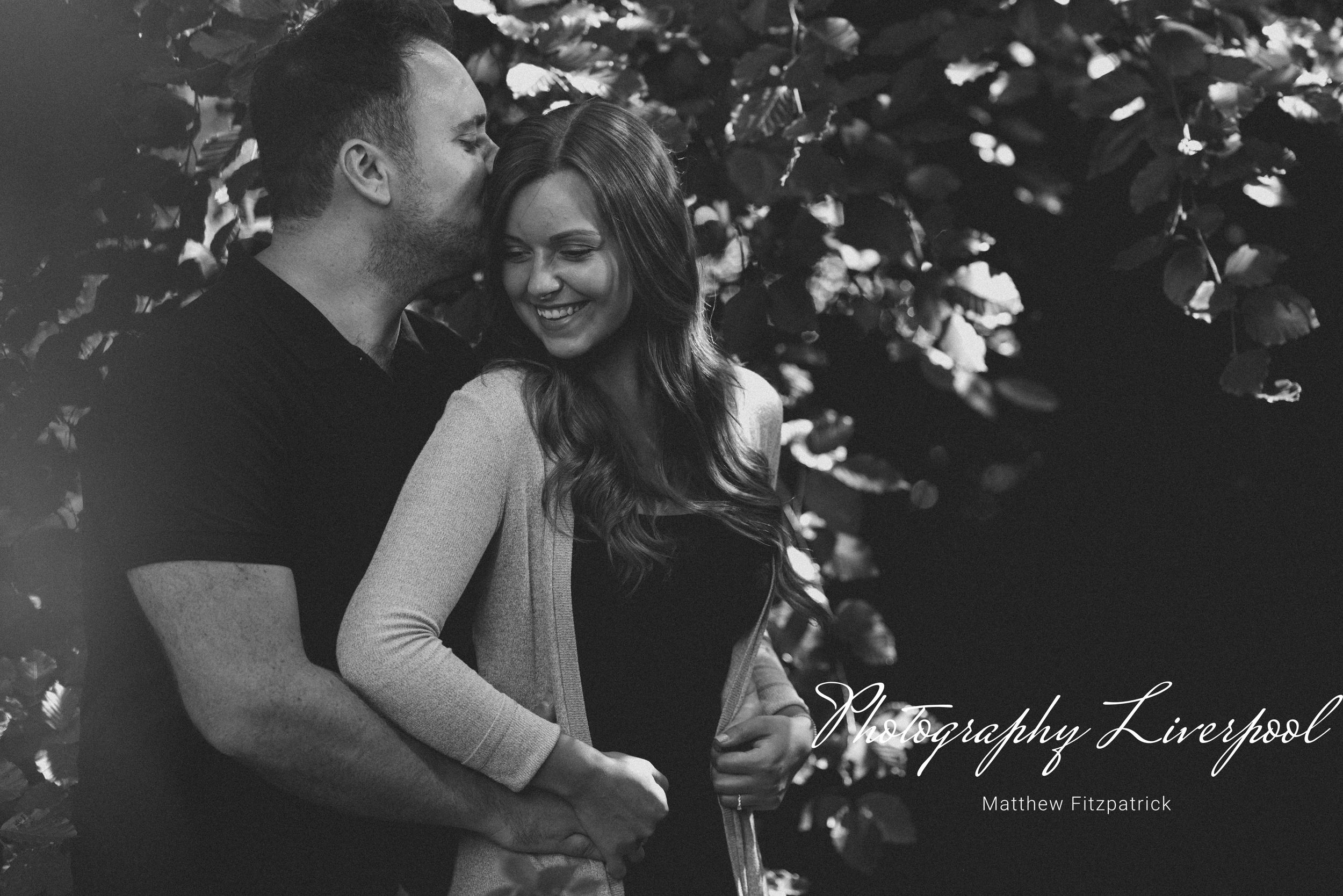 Black & White Naturally posed engagement photography at Sefton Park by Photography Liverpool Wedding Photographer