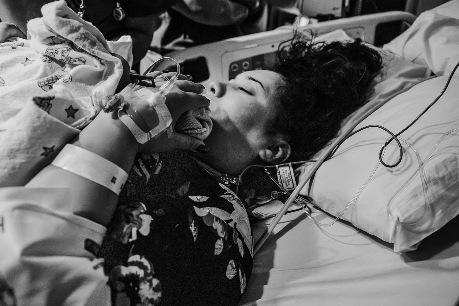 Mom cuddles newborn baby just moments after birth in San Antonio Hospital