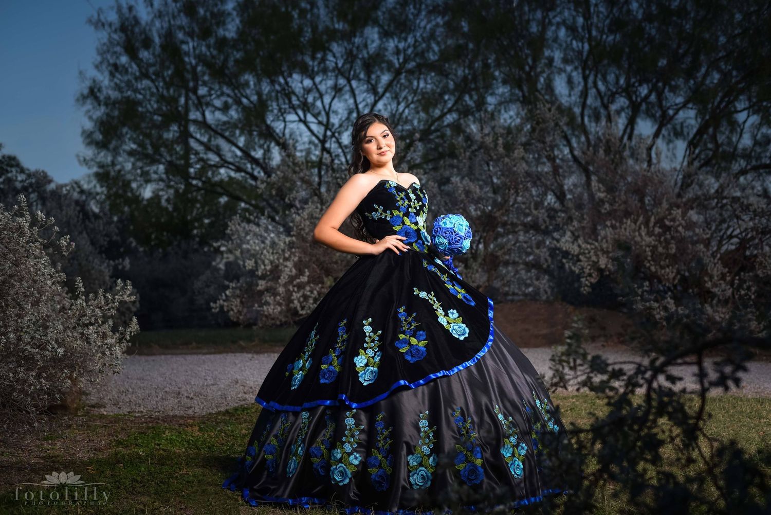 traditional mexican blue and black handmade quince dress photography session fort worth stockyards fotolilly photography
