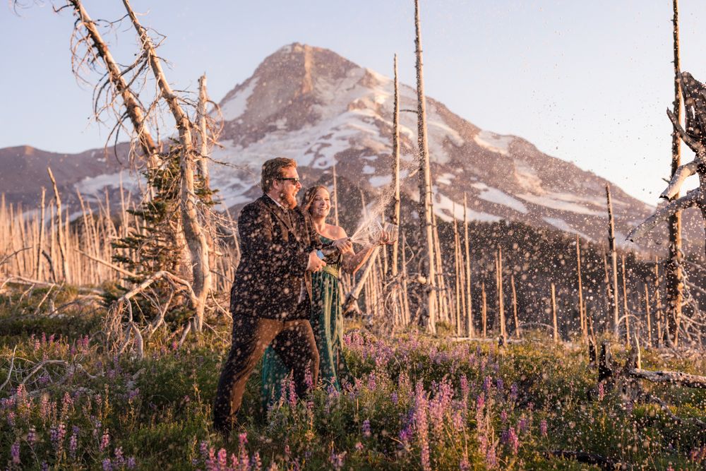 Engagement couple enjoying Champaign in front of Mt. Hood in Oregon