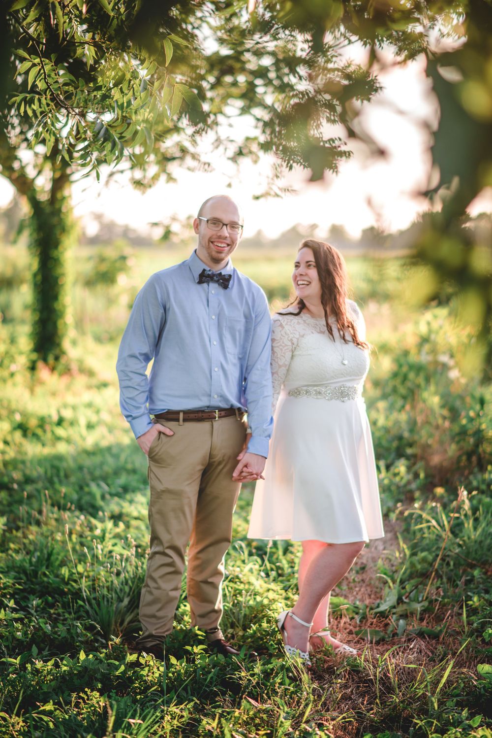 Engagement photo of a couple standing