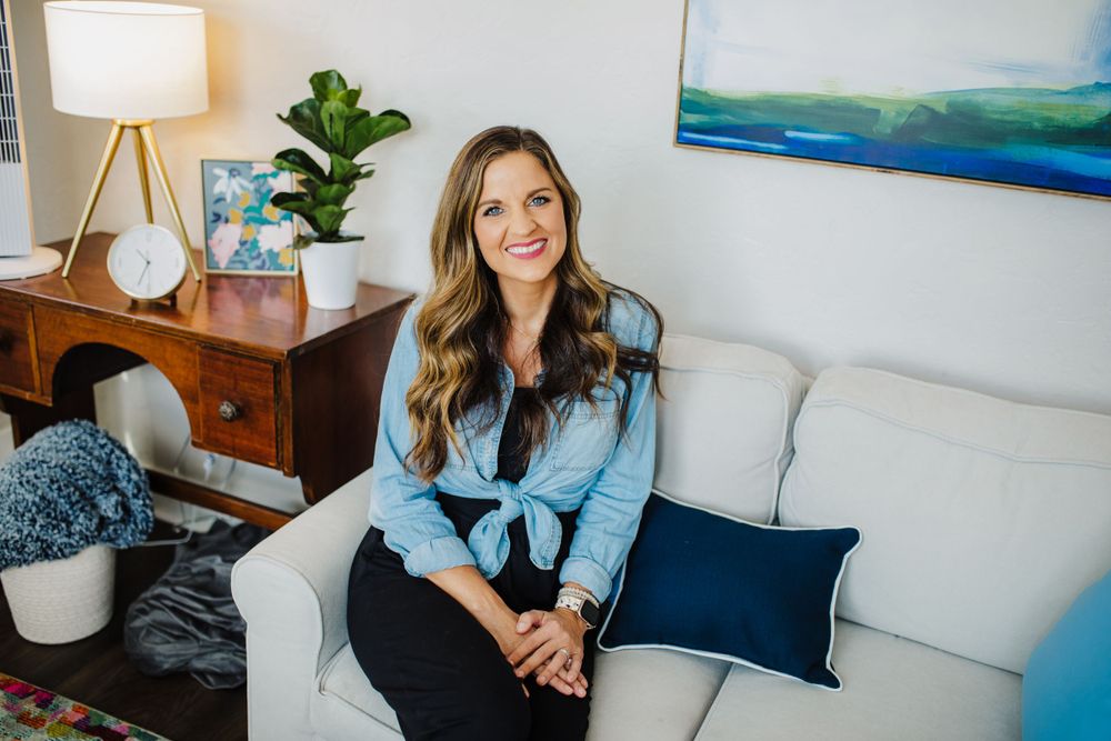 Natural light indoor portrait sitting on white couch