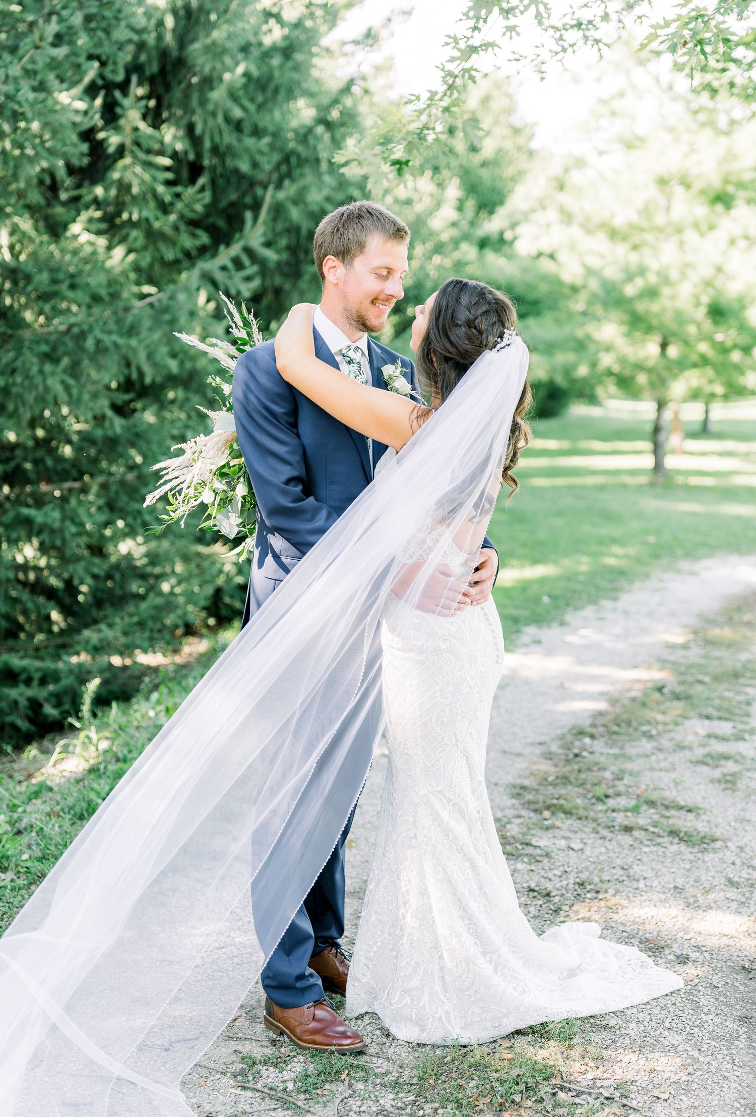 Vineyard photos with white willow events at Prairie Moon Winery wedding in Ames, Iowa
