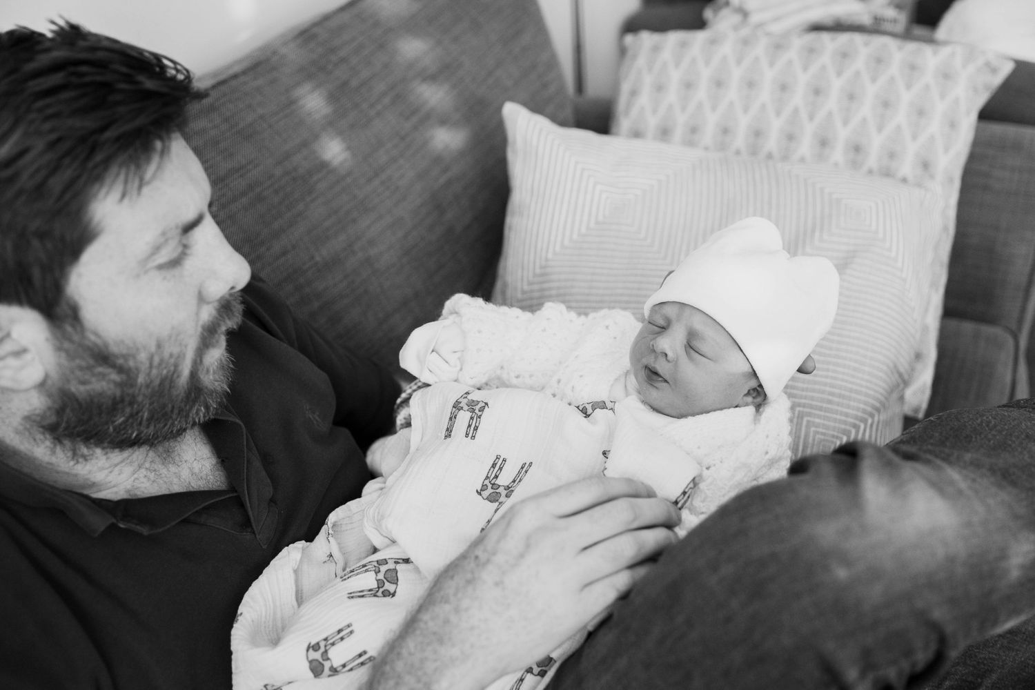 newly born baby girl in hat
