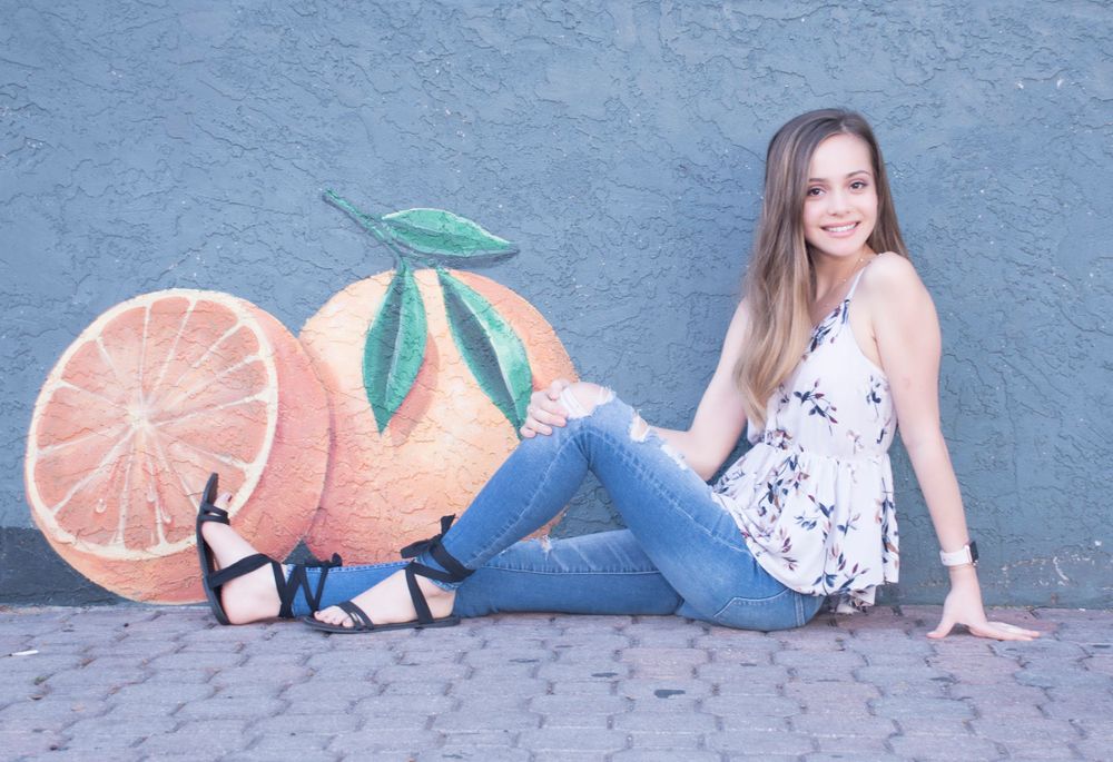 senior photo of girl outdoors by Kathleen Hall Photography