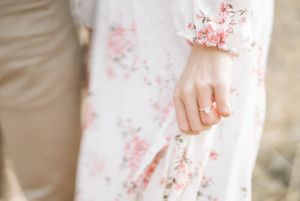 Light and airy film lakeside dock engagement session at Gray's Lake in Des Moines, Iowa