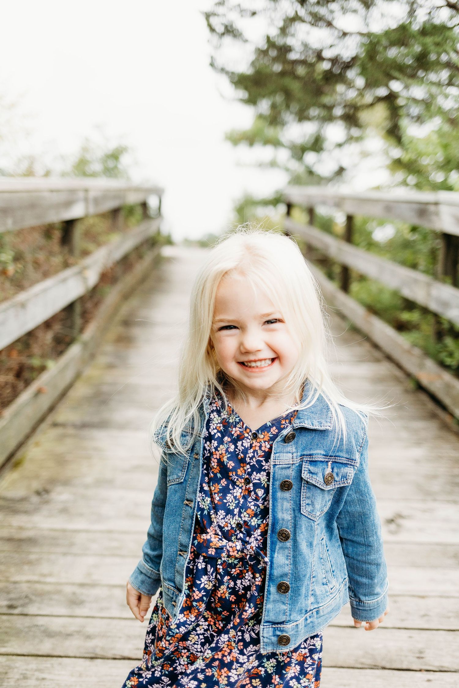 Adorable little girl smliing during family photos in Hartland wi