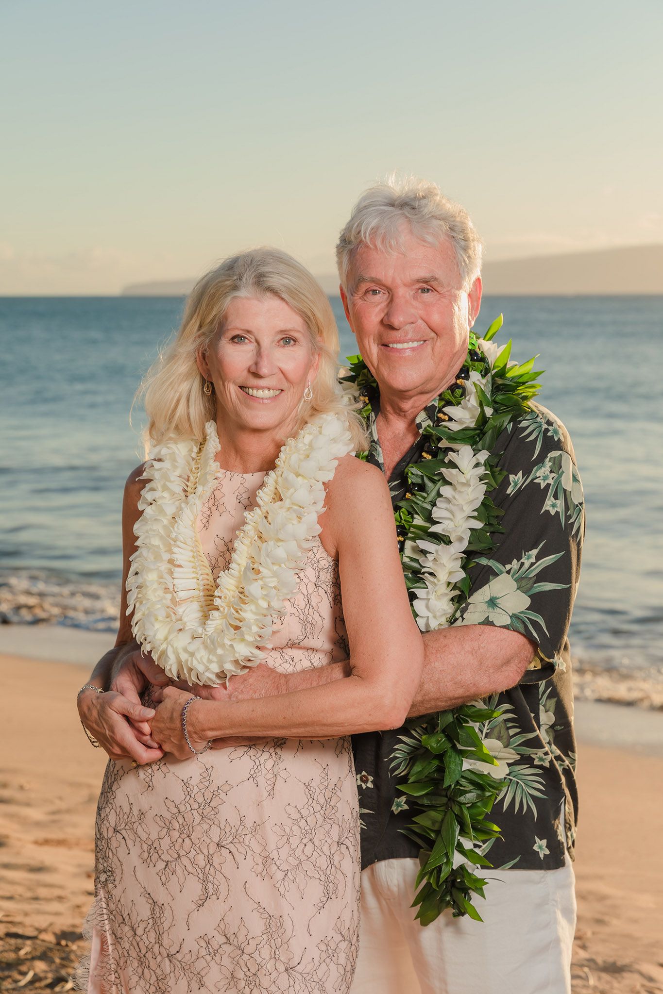 newlywed couple embrace