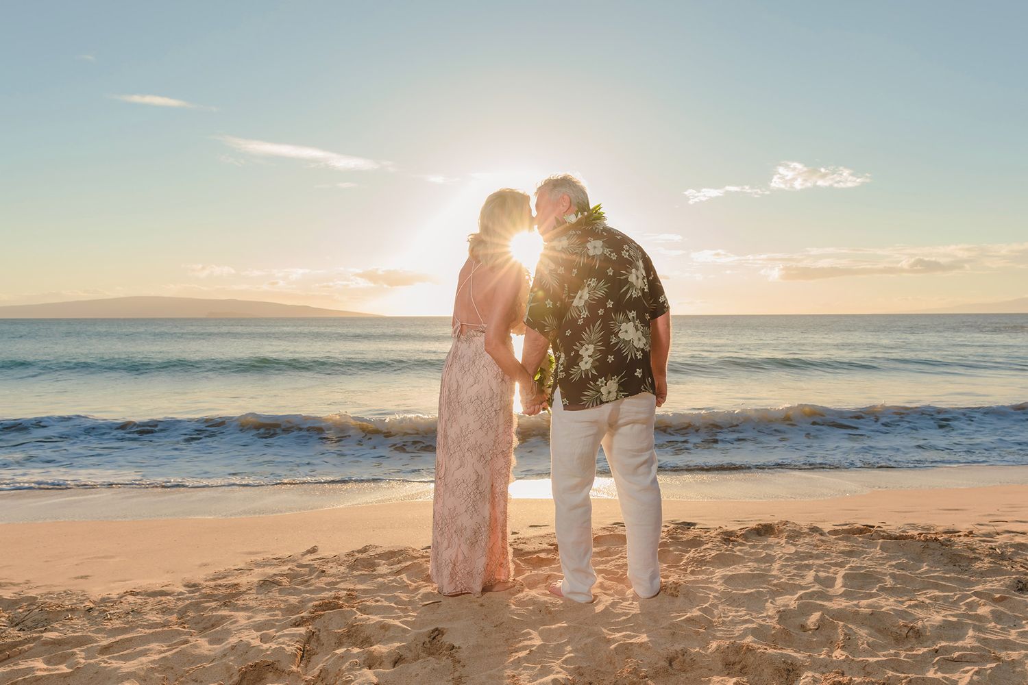 sunset kiss on beach at sunset