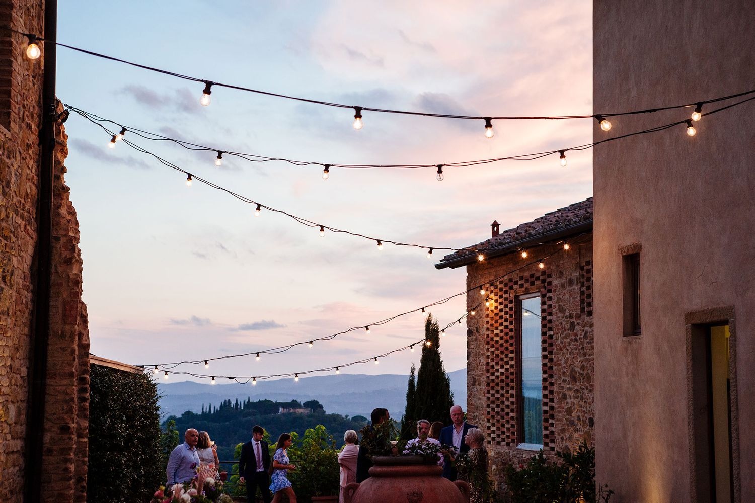 warm weather in October to keep the wedding party outside at this Tuscan villa wedding