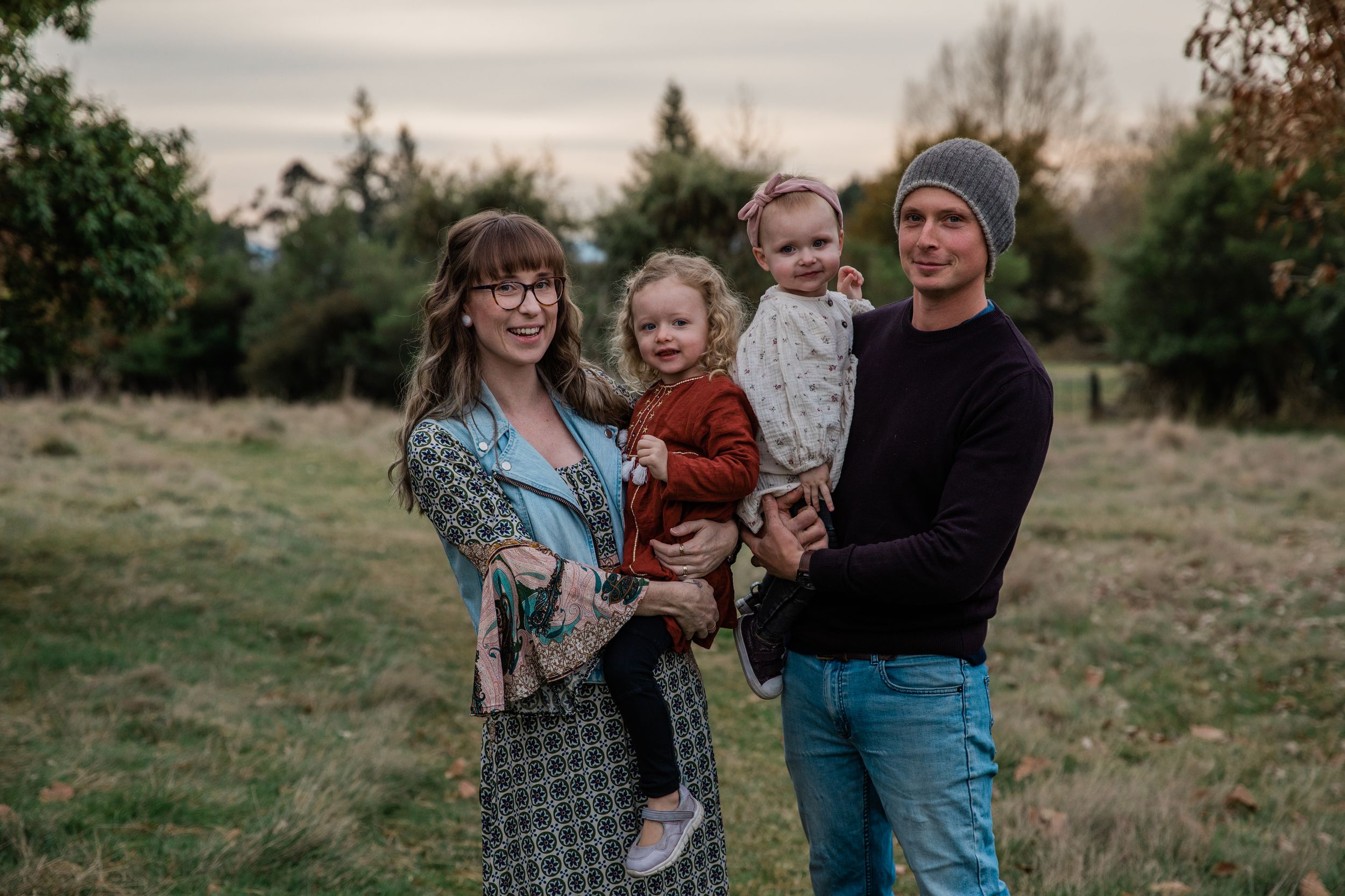 Family of four at rotorua tree trust looking at the camera