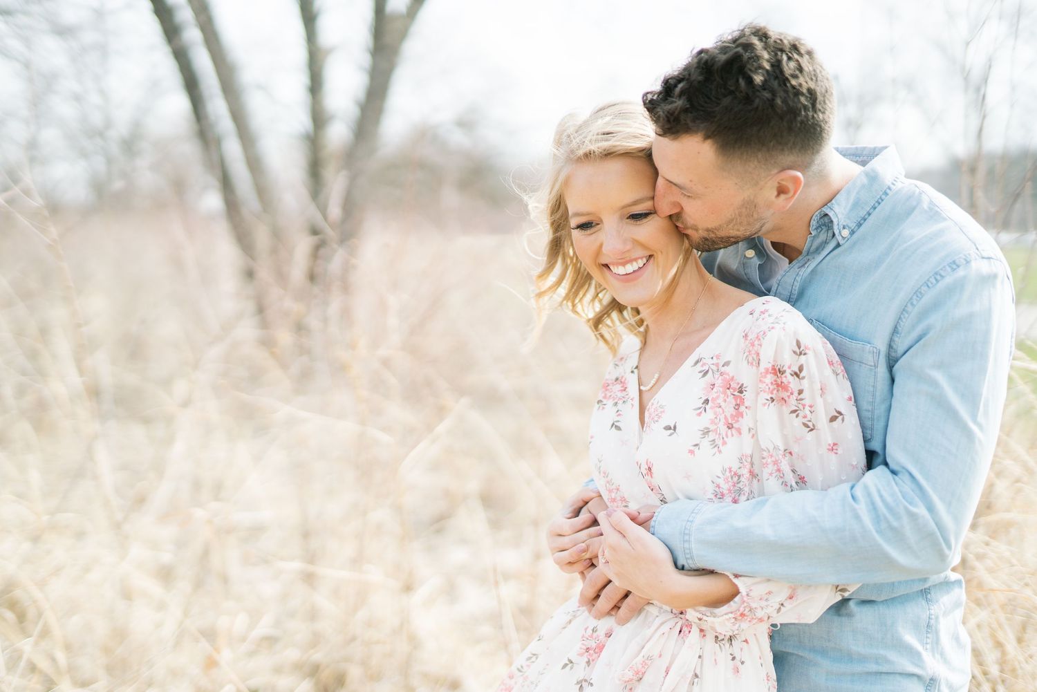 Light and airy film lakeside dock engagement session at Gray's Lake in Des Moines, Iowa