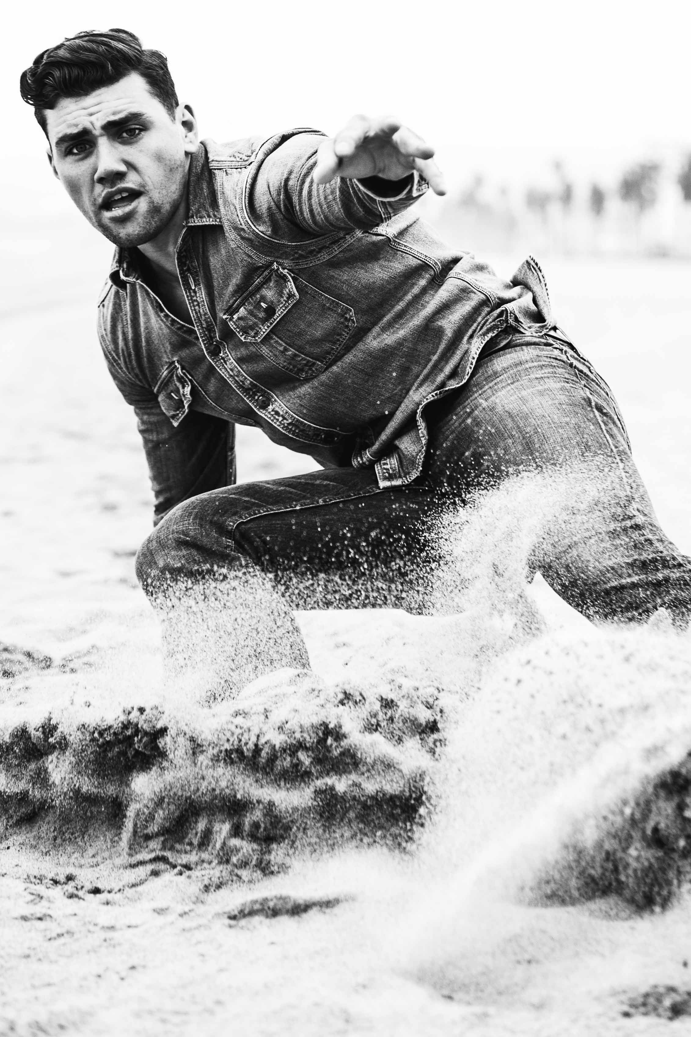 Actor Christian James Levi's Denim Trucker Jacket Jeans Sand Venice Beach Overcast