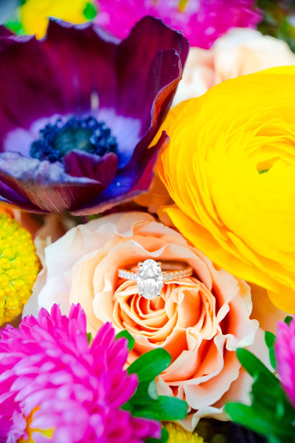 oval engagement ring in peach rose