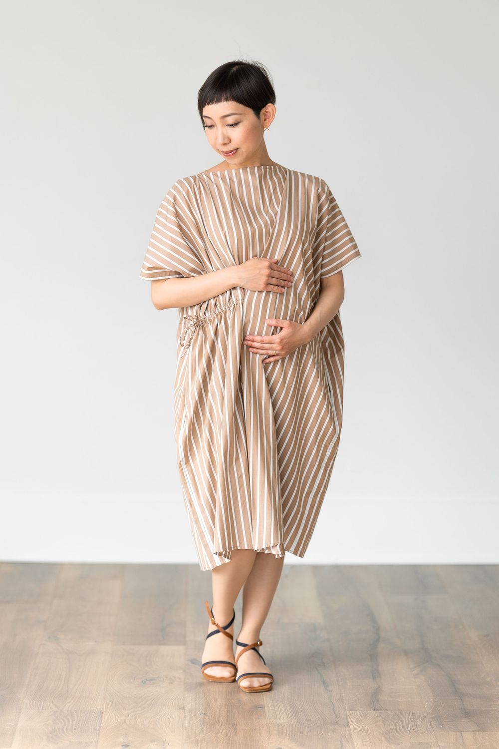 Maternity portrait, white studio