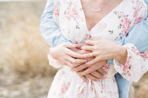 Light and airy film lakeside dock engagement session at Gray's Lake in Des Moines, Iowa