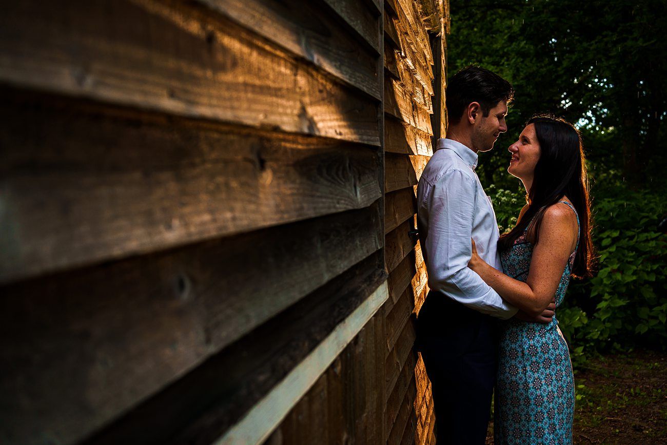 couple hugging looking at each other during sunset