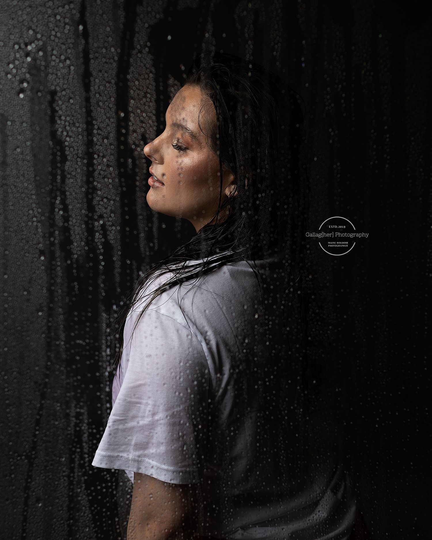 Professional boudoir photo of a woman in the shower